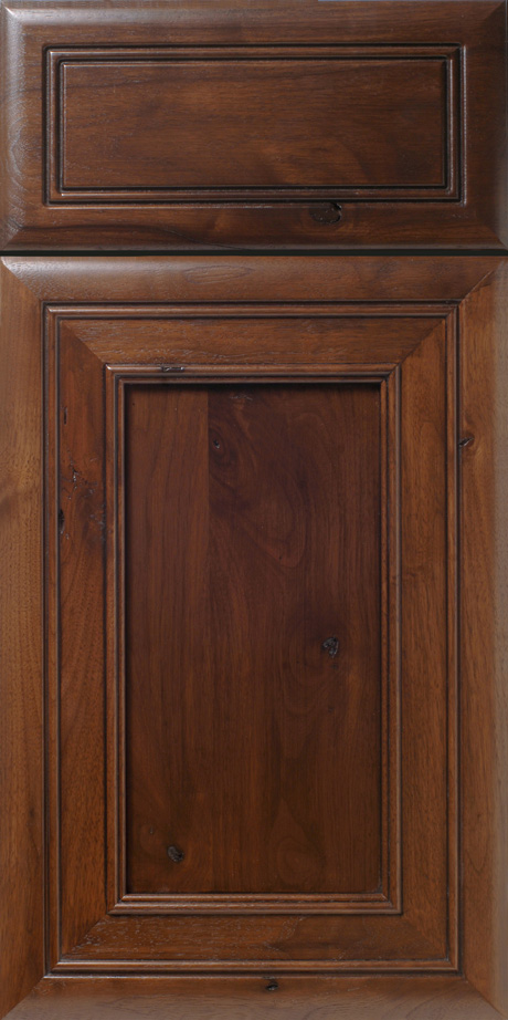 A close-up of a S609 BAYBORO cabinet door with detailed wood grain and paneling.