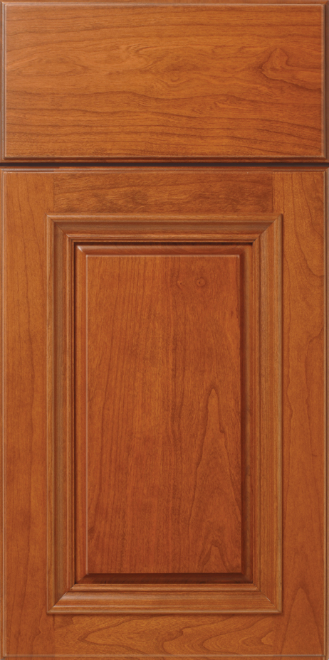 A close-up of a wooden cabinet door with a raised panel design S464 IMPERIAL.