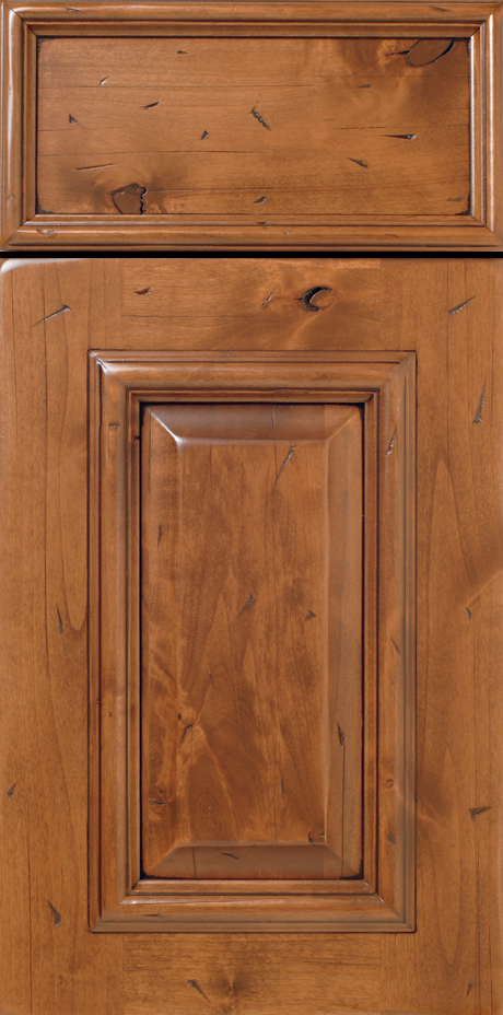 Close-up of a S160 ALAMO wooden cabinet door with a raised panel design.