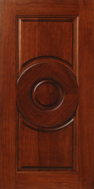 Circular wooden S704 COMPASS handle on a polished wooden door.