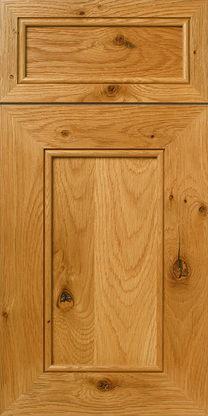 A vertical image of a closed, wooden panel door with a natural finish of S892 FRONTIER.